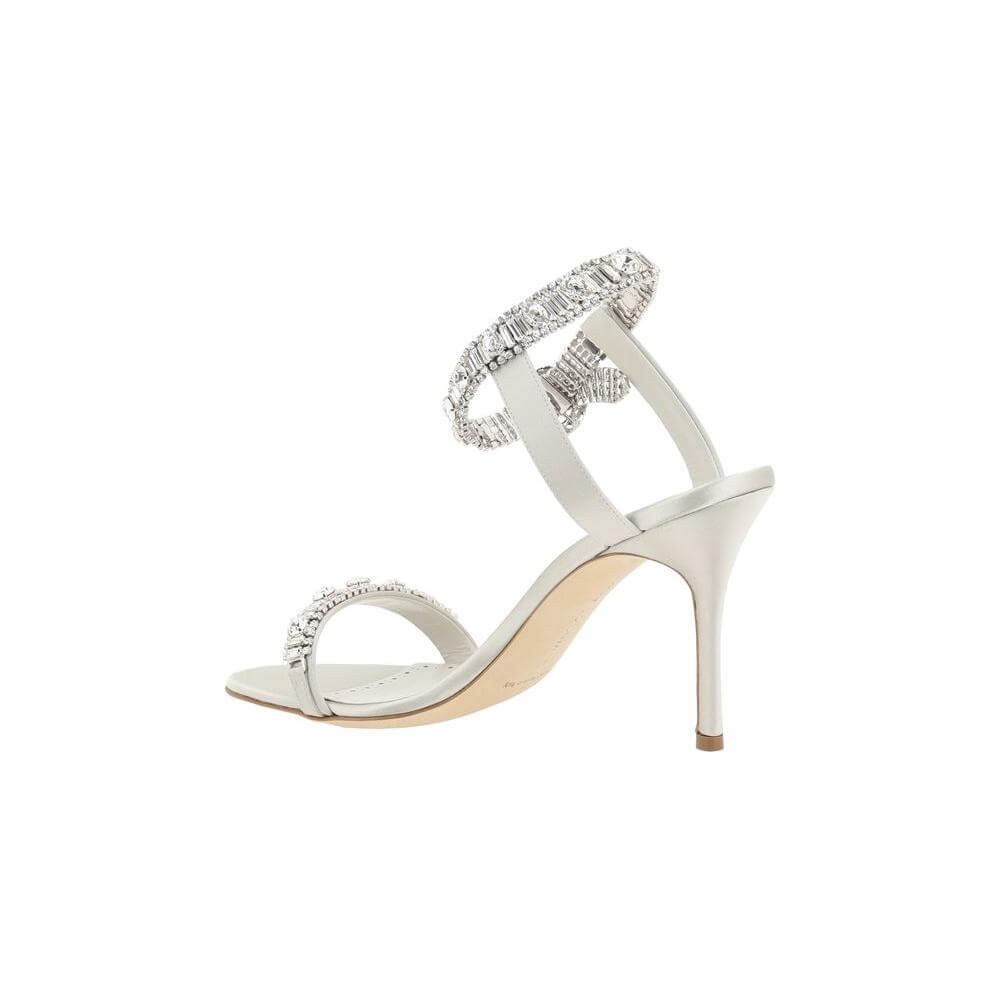 Manolo Blahnik Asasan Satin Sandals with rhinestone embellishments, featuring stiletto heel and adjustable ankle buckle closure.