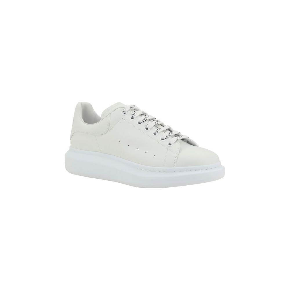 Alexander McQueen sneakers with lace-up front, round toe, logoed tab and heel, and platform sole in white leather.