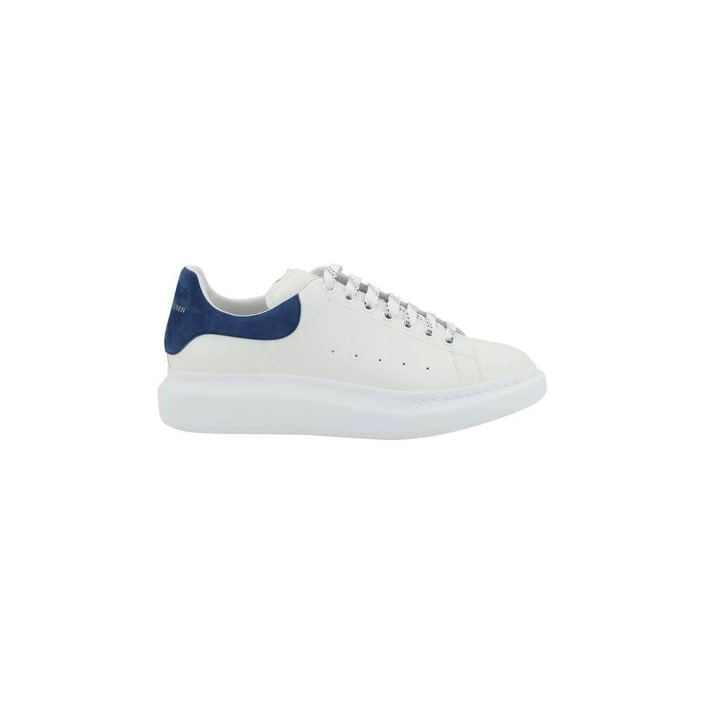 Alexander McQueen leather sneakers with white design and blue details, featuring lace-up closure and logo-embossed accents.