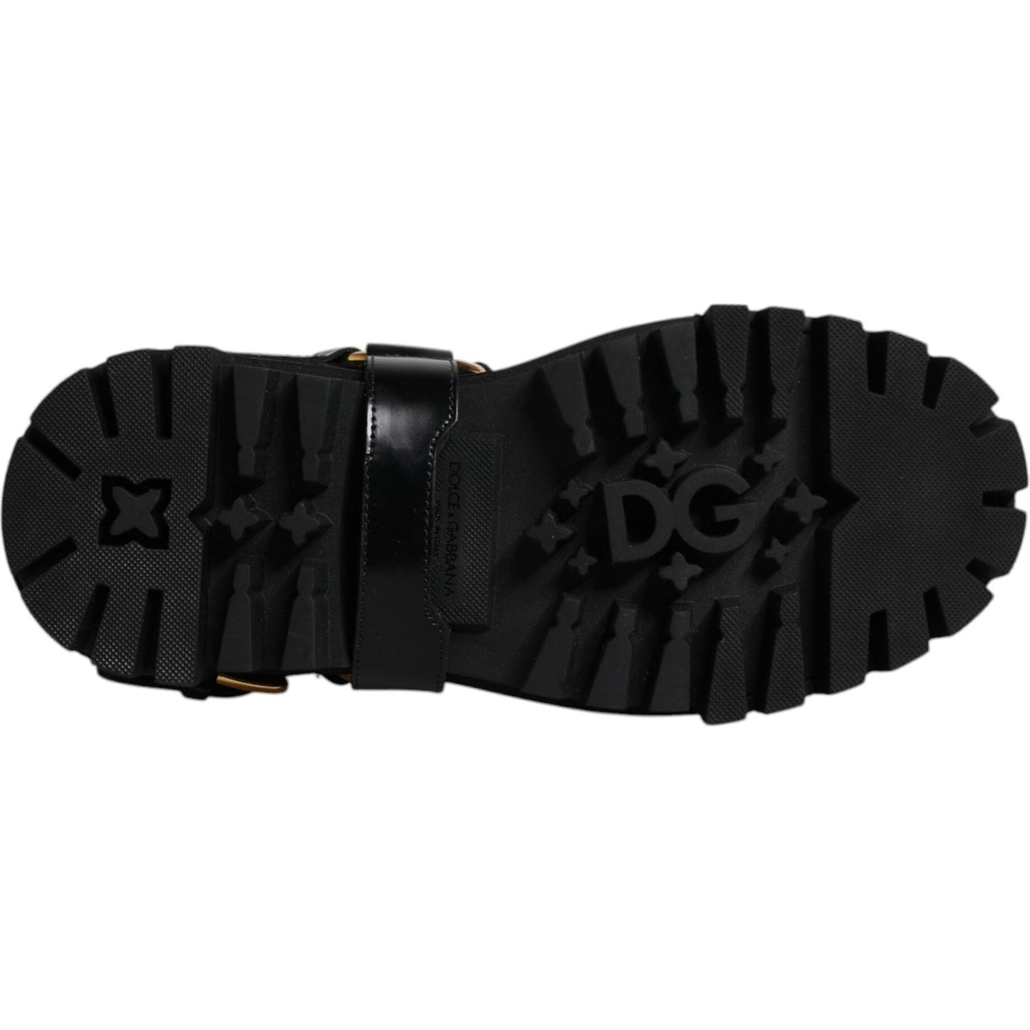 Sole view of Dolce & Gabbana Black Leather Slip On Stretch Trekking Boots with DG logo, rubber grip for traction. Made in Italy.