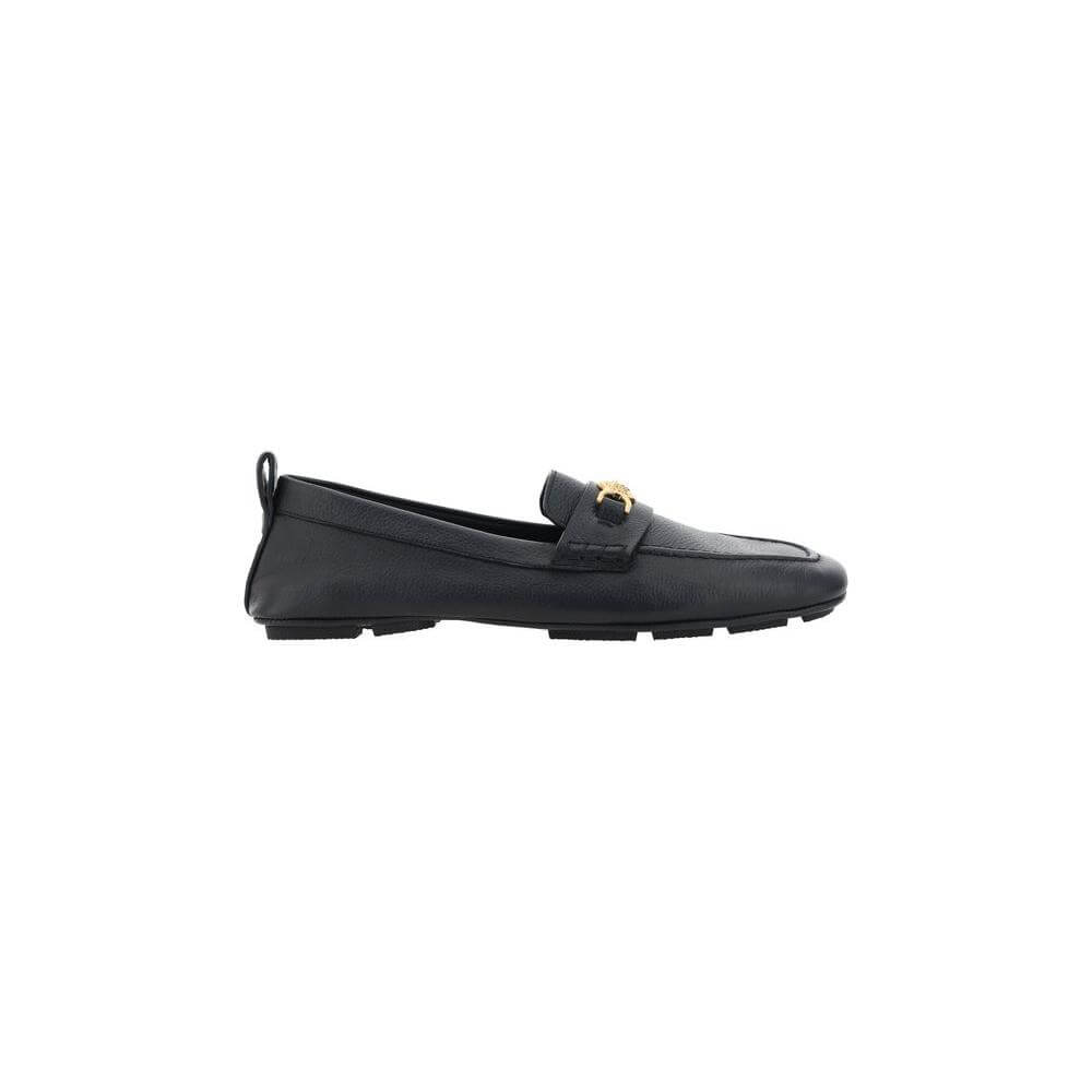 Versace leather driver loafers with metallic Medusa detail, Greca motif, and hammered finish.