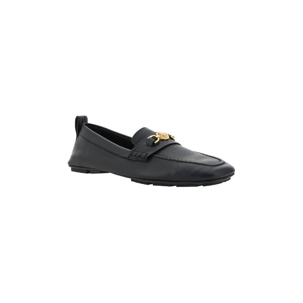 Versace leather driver loafers with metallic Medusa head and Greca motif, featuring an injected sole and hammered finish.