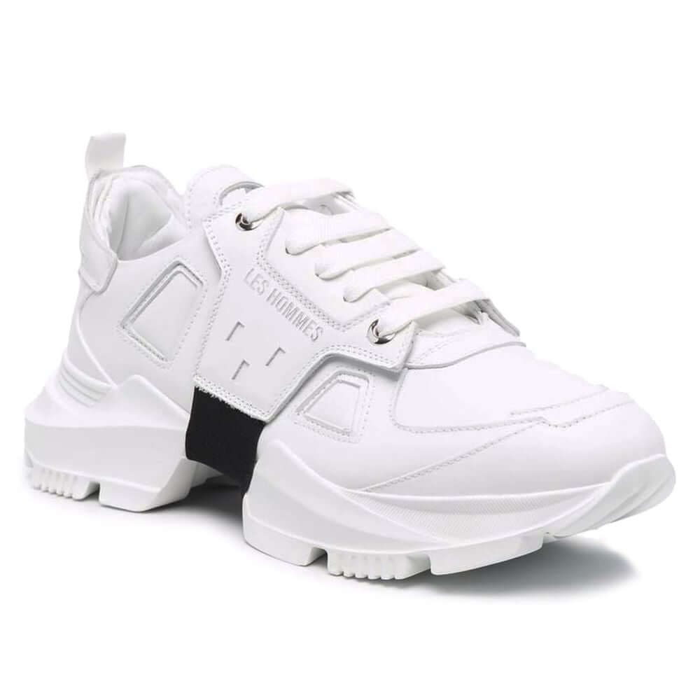 Les Hommes white calfskin men's sneaker with black nylon band and rubber sole, showcasing Italian craftsmanship and luxe style.