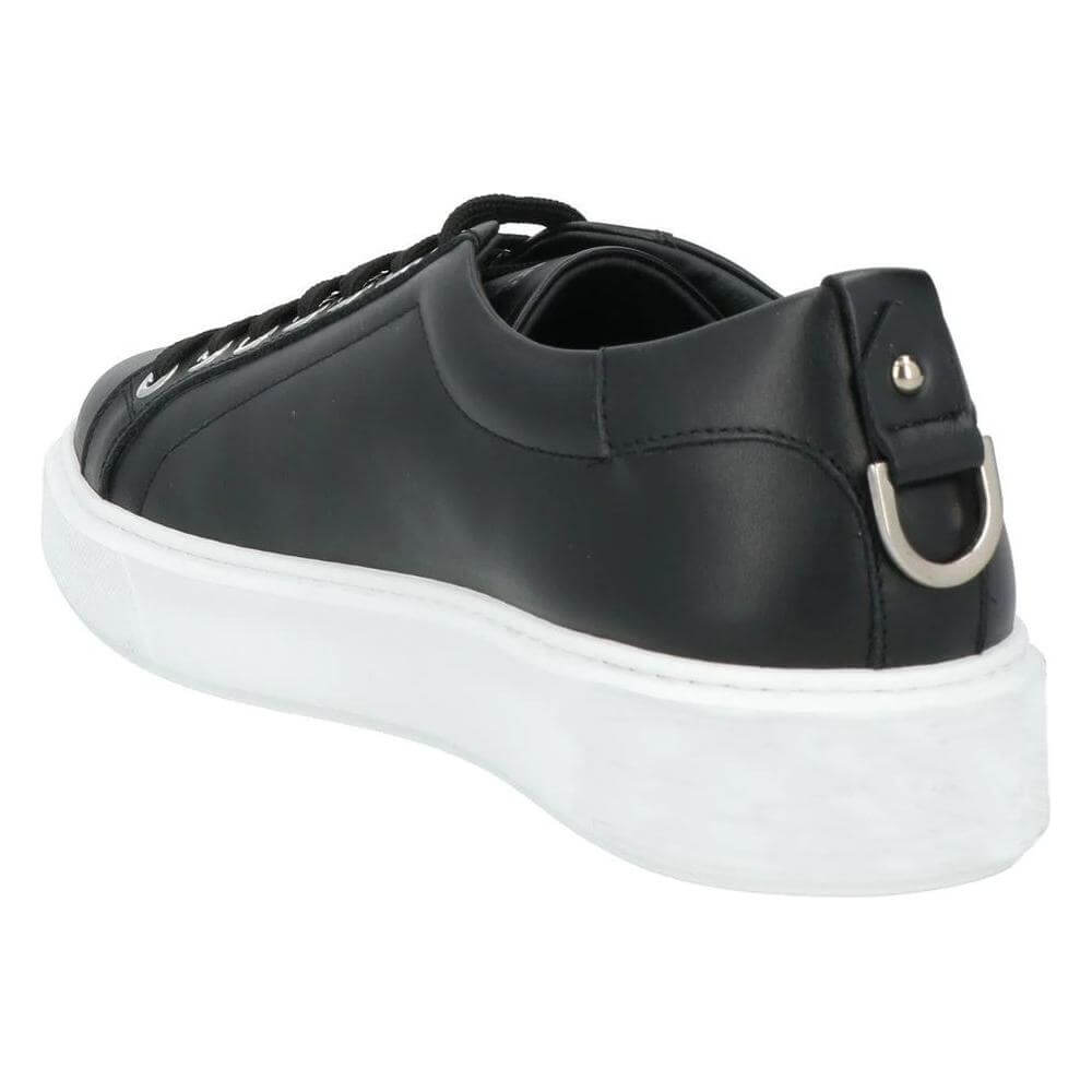 Les Hommes black calfskin men's sneaker with metal ring detail and white rubber sole, luxury Italian design.