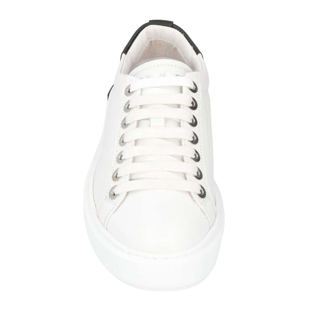 Front view of Les Hommes white calfskin sneaker with black heel and silver logo on tongue, featuring durable white rubber sole.