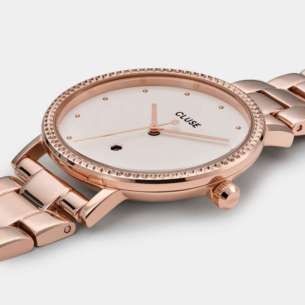 Cluse multicolor stainless steel watch with quartz mechanism, pink case and bracelet, white analog dial, 33mm diameter.