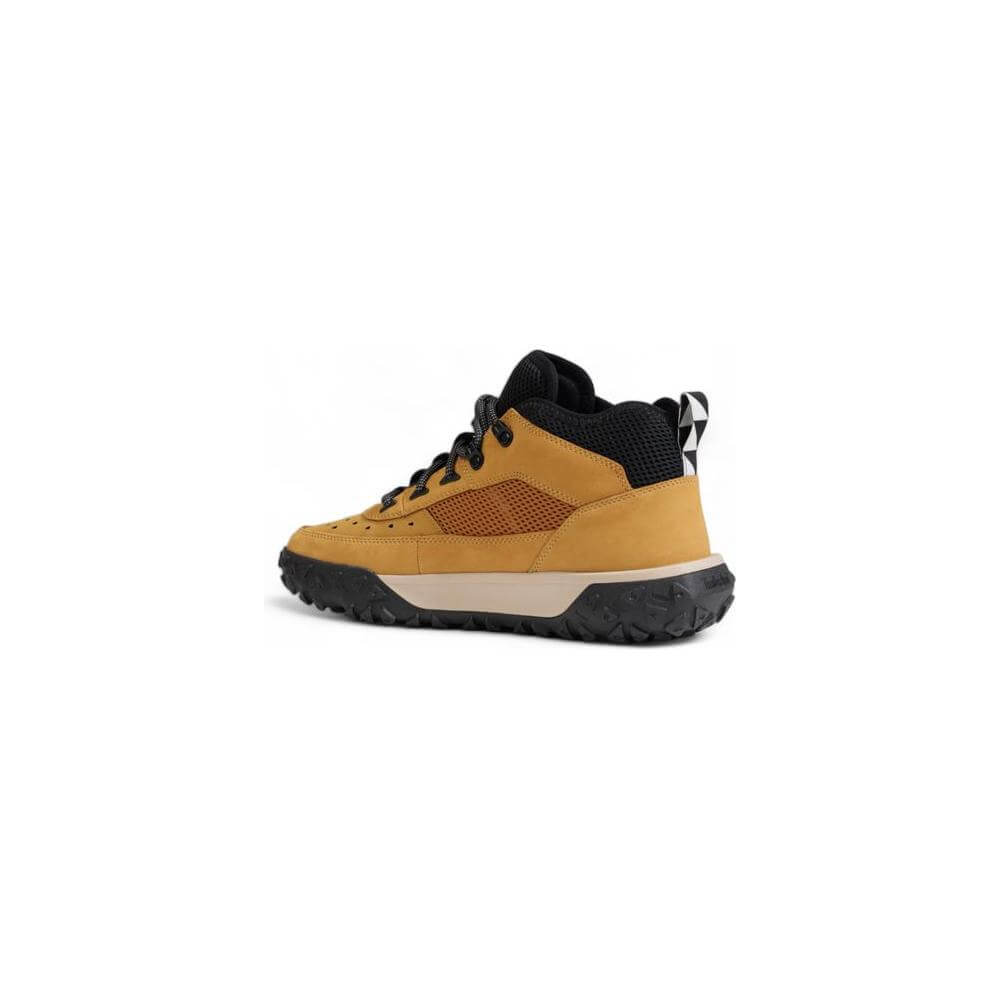 Timberland brown recycled leather sneaker, eco-friendly mid-cut shoe for men with strong ankle support and durable rubber sole.