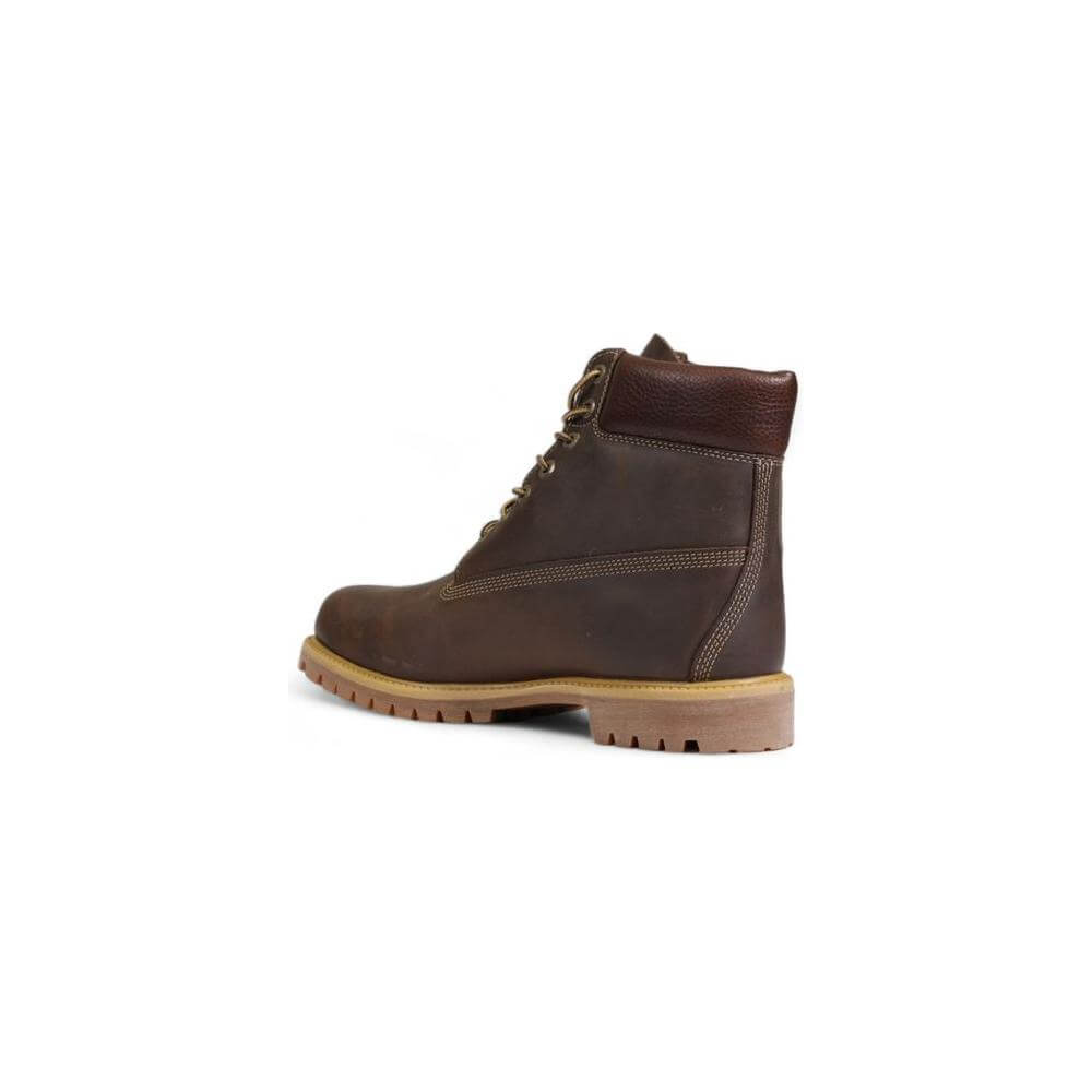 Side view of Timberland 6 In Lace Waterproof Brown Leather Boot for men, featuring a durable rubber sole and stylish design.