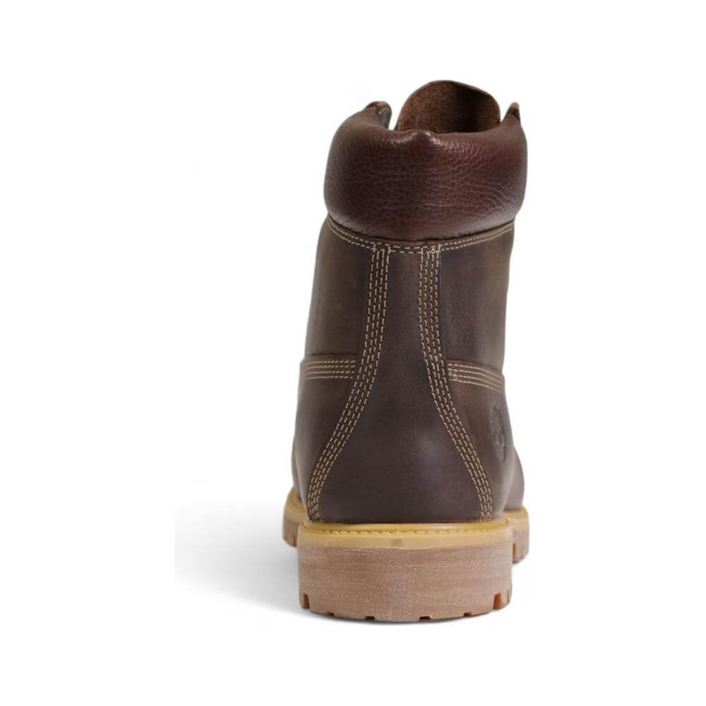 Rear view of Timberland Brown Leather Waterproof Boot showcasing durable stitching and rubber sole.
