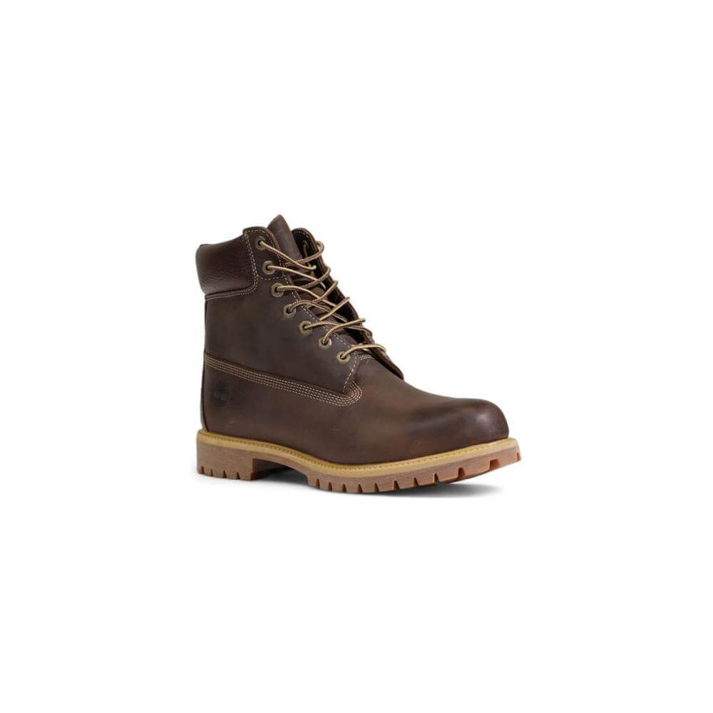 Timberland brown leather lace-up boot with rubber sole, perfect for outdoor adventures, waterproof and durable.