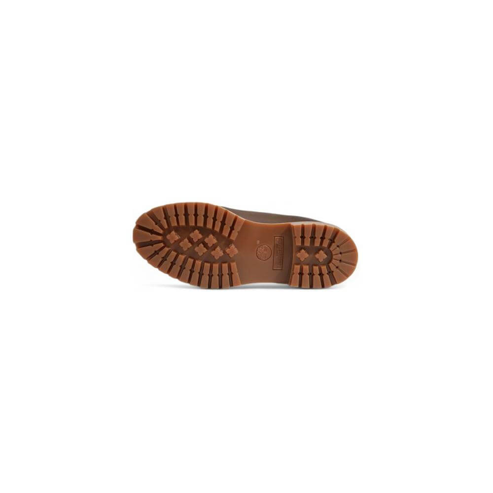Sole of Timberland Brown Leather Boot showcasing durable rubber tread for superior grip on various terrains.