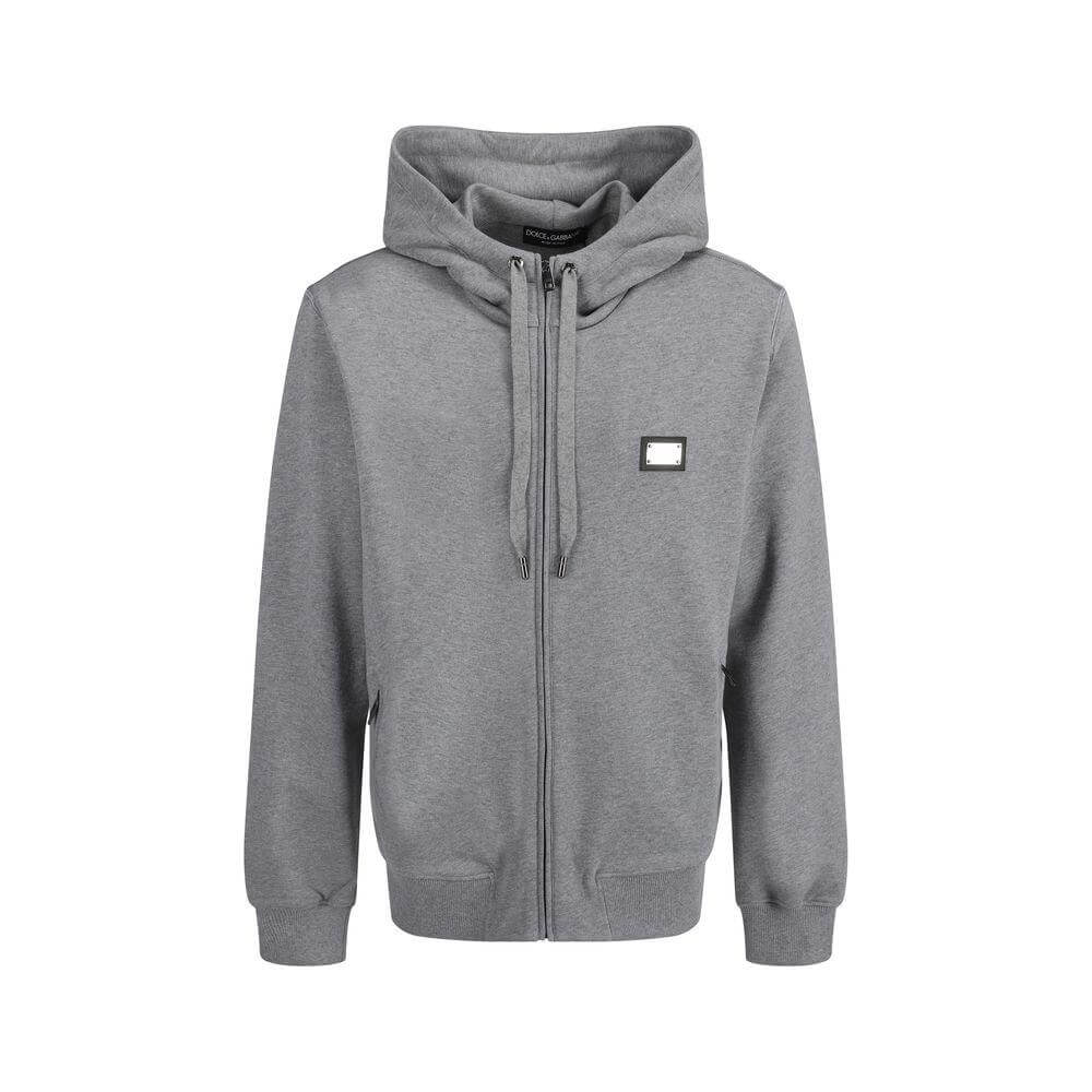Dolce & Gabbana cotton hoodie, gray, with drawstring hood, ribbed cuffs, side zipper pockets, and D&G metal monogram plaque on front.
