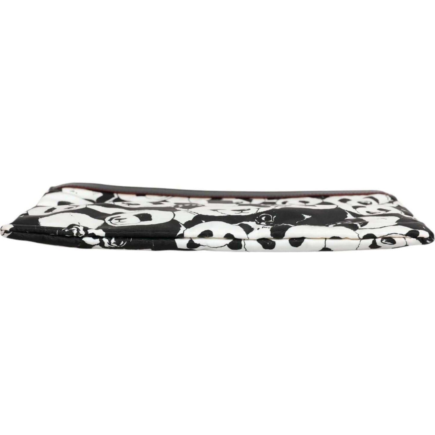 Dolce & Gabbana black and white panda pattern clutch bag with gunmetal-tone hardware and zip closure, side view.