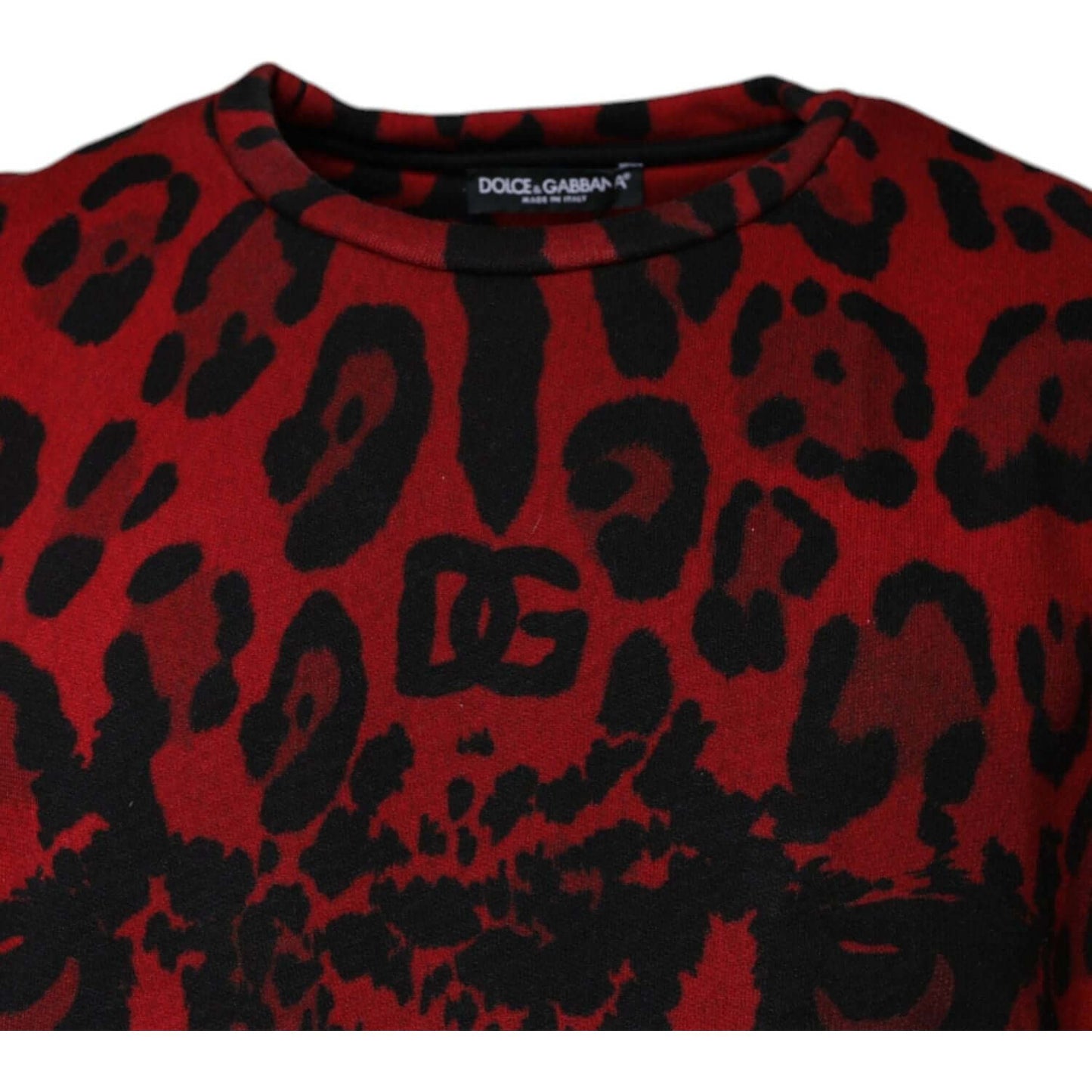Red leopard print Dolce & Gabbana sleeveless t-shirt featuring black logo details, made from 100% cotton, and round neck design.