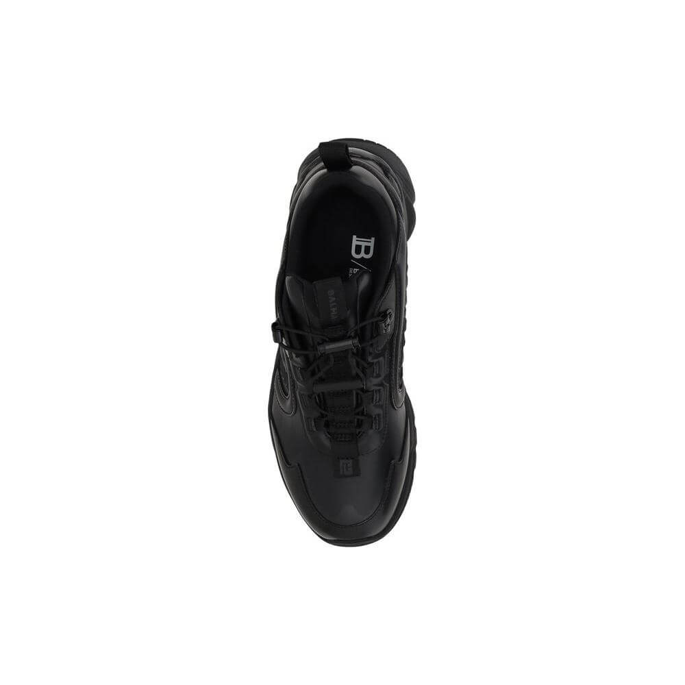 Top view of Balmain Cosmic Sneakers, featuring a sleek leather design, round toe, embossed logo, elasticized laces, and platform sole.