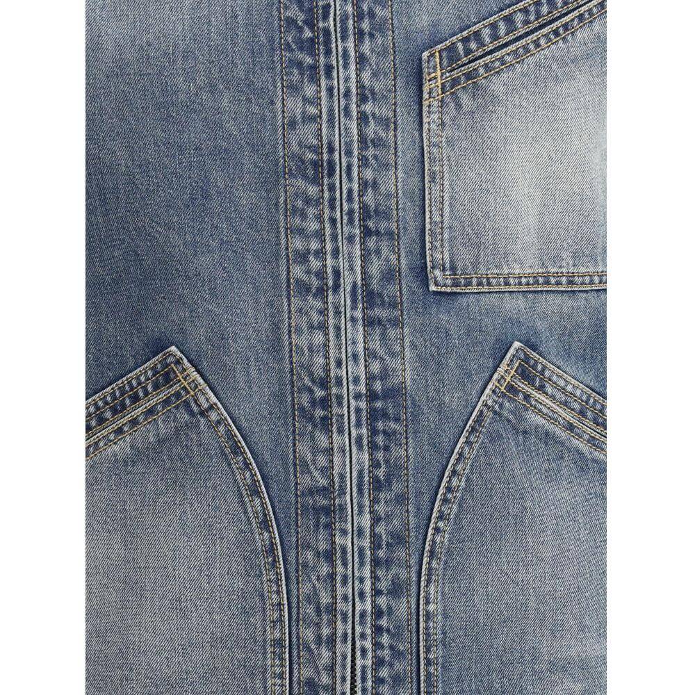 Close-up of Alexander McQueen denim jacket showcasing detailed stitching and front patch welt pocket for style and practicality.