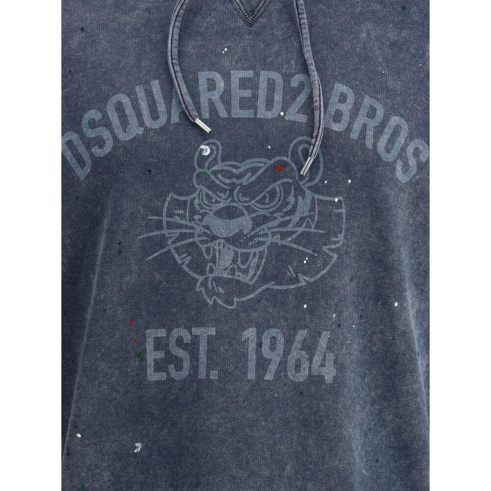 Dsquared² Cypro Hoodie with adjustable hood, ribbed cuffs, iconic monogram, and vintage paint-speckled design, establishes post-1964 style.