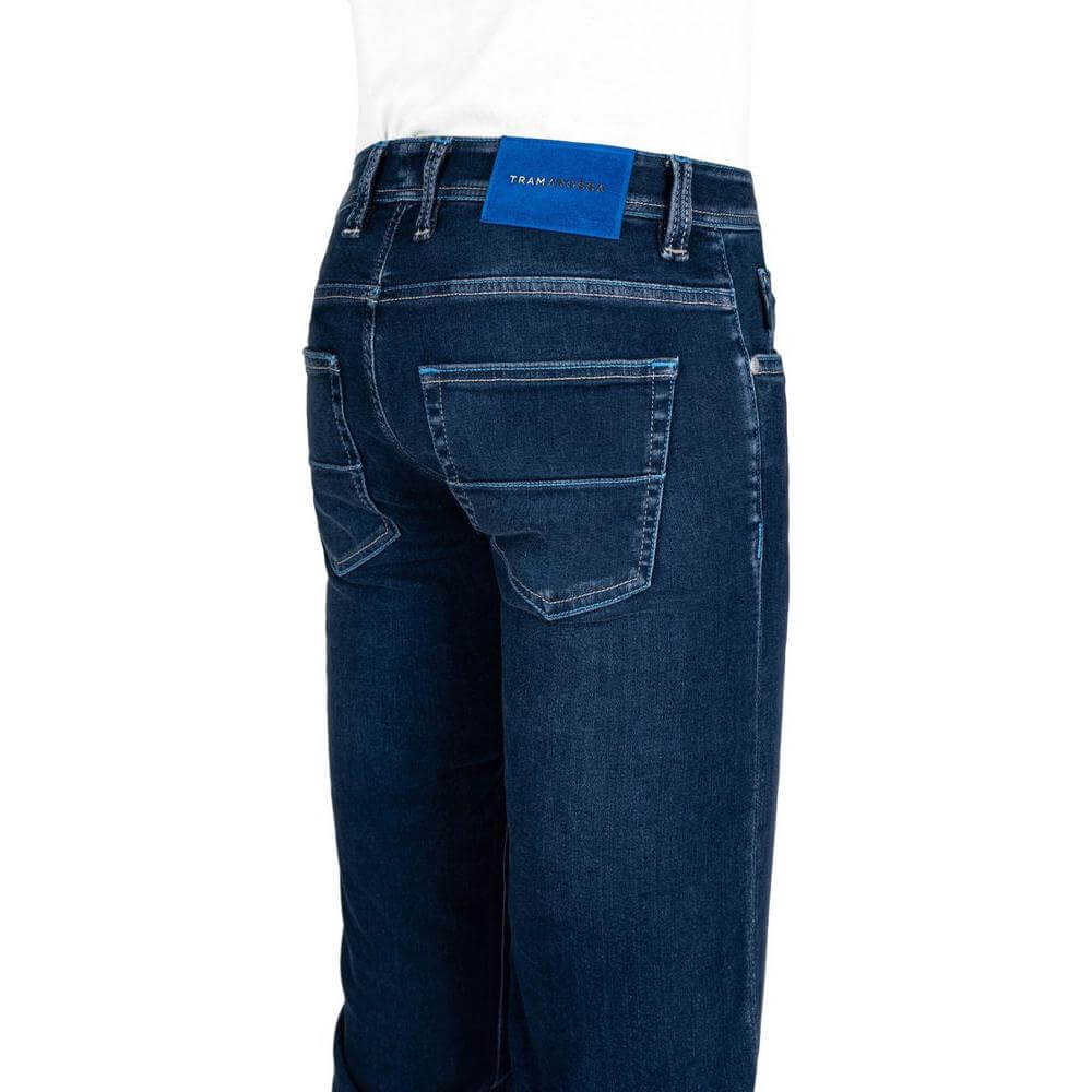 Back view of Tramarossa blue cotton men's jeans with suede patch and metal logo, showcasing classic five-pocket design and regular fit.