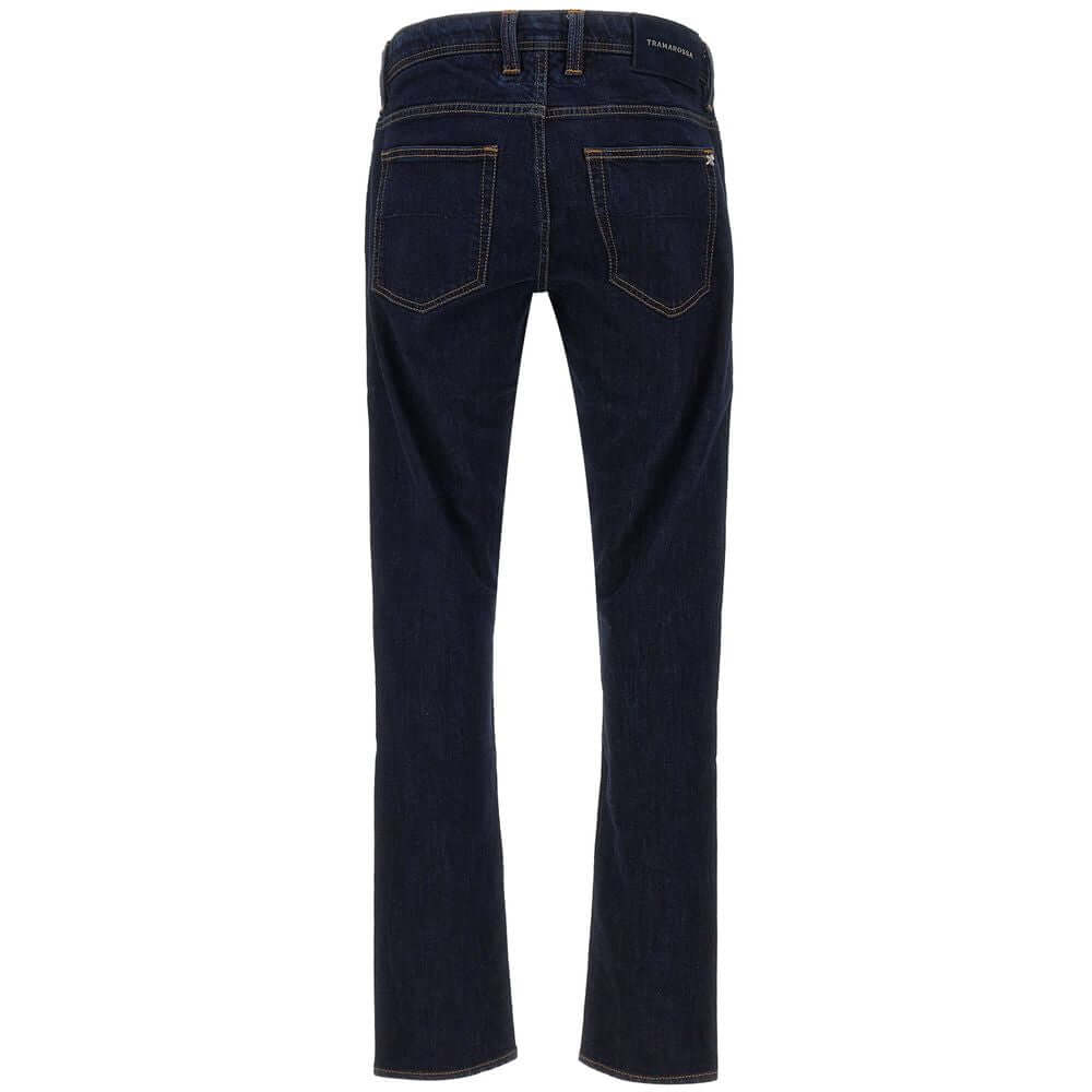Back view of Tramarossa dark blue cotton jeans, regular fit, with suede patch and metal logo on rear pockets.