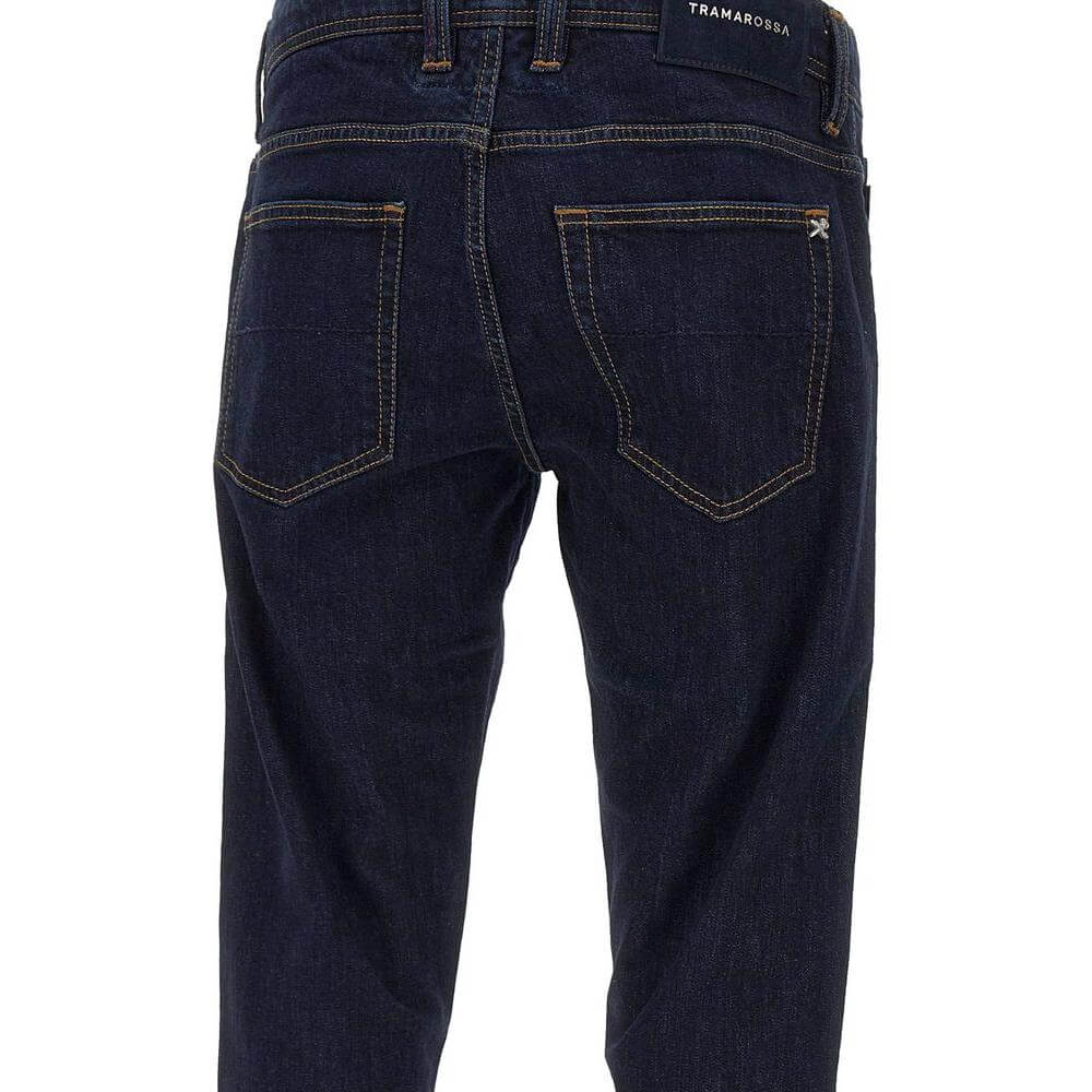 Back view of Tramarossa dark blue cotton jeans with suede patch and metal logo, featuring a regular fit and five-pocket design.