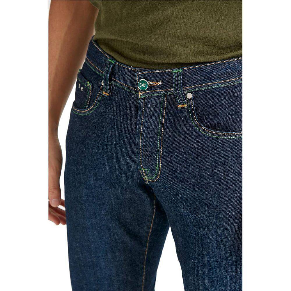 Tramarossa blue jeans in stretch cotton with green stitching and button, five-pocket design, regular fit with suede patch detail.