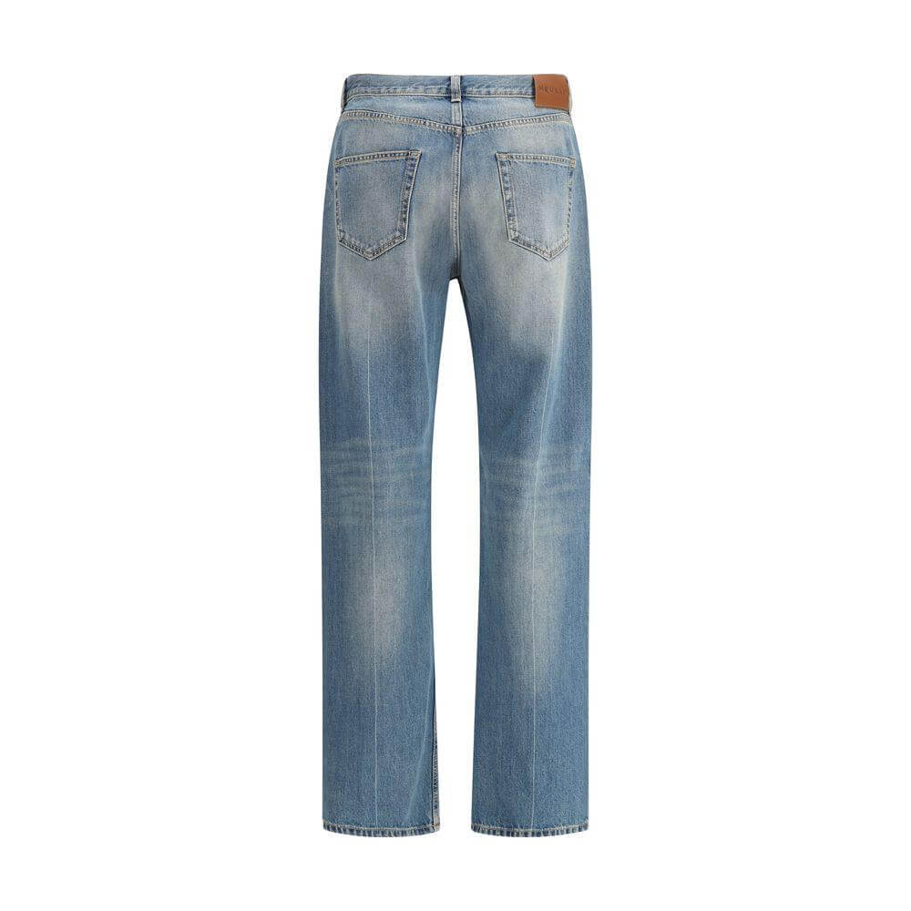 Back view of Alexander McQueen straight jeans with high waist and iconic skull logo plaque.