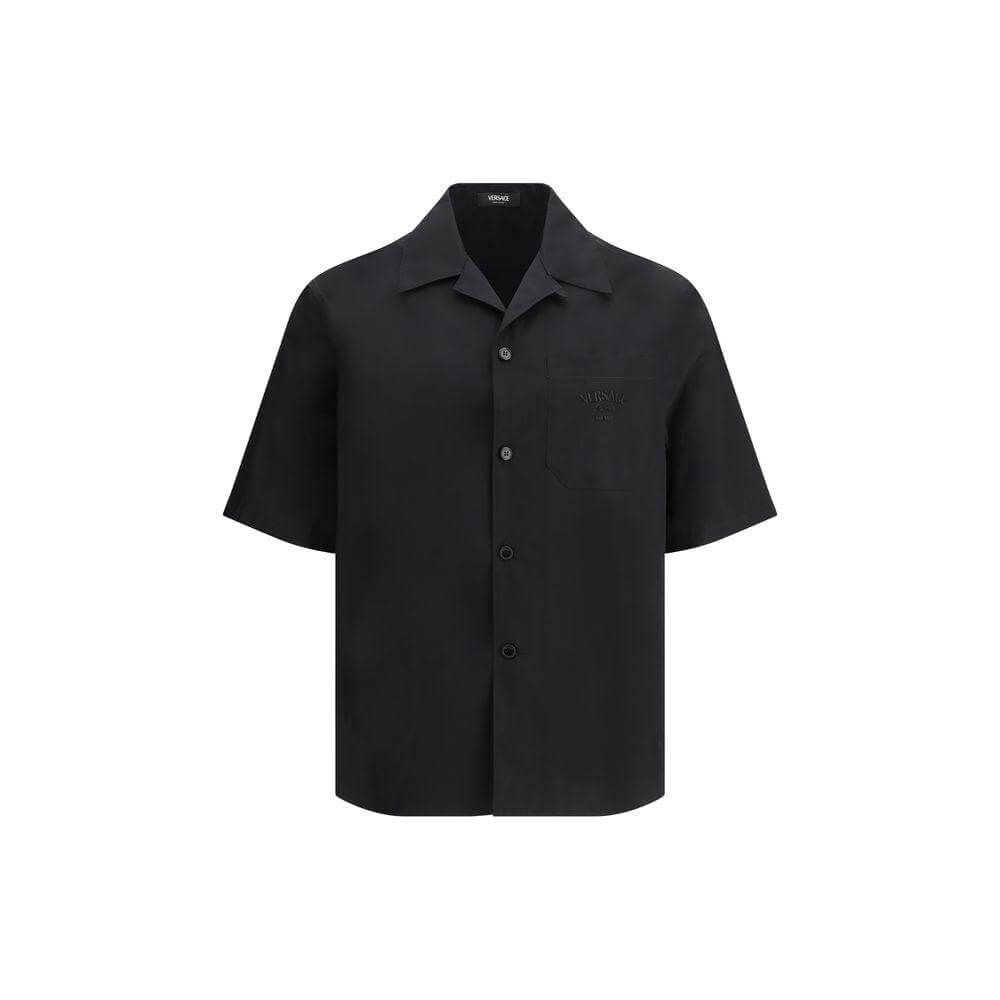 Versace Medusa pattern shirt in black with short sleeves and classic collar, featuring front patch pocket and iconic logo.