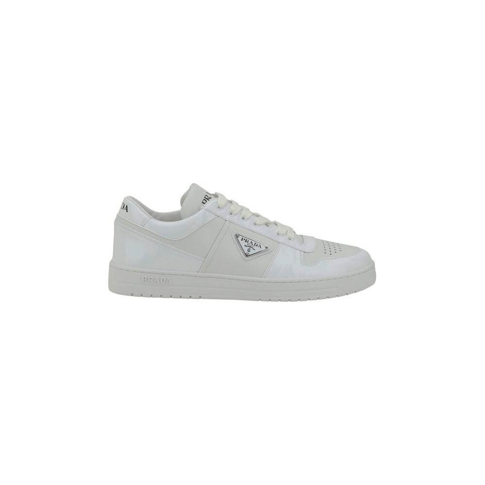 Prada Downtown white leather sneakers with lace-up closure, enameled plaque, breathable perforated toe, and contrasting heel logo.
