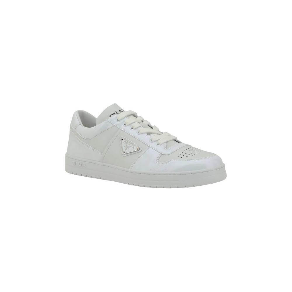 Prada Downtown leather sneakers with lace-up closure and iconic triangular plaque, featuring perforated toe and contrasting heel logo.