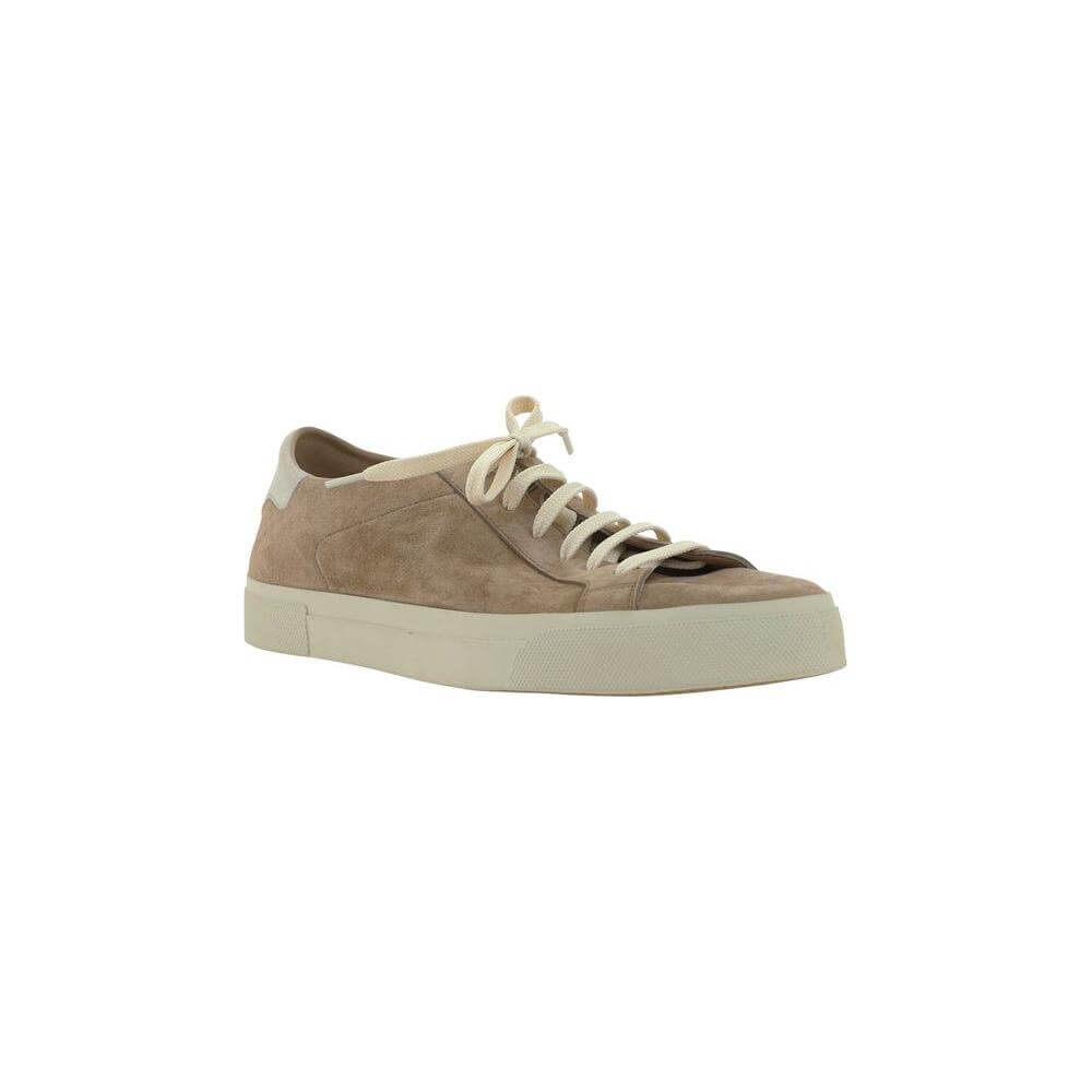 Brunello Cucinelli calfskin sneakers with suede design, round toe, lace-up fastening, and branded label at the heel.