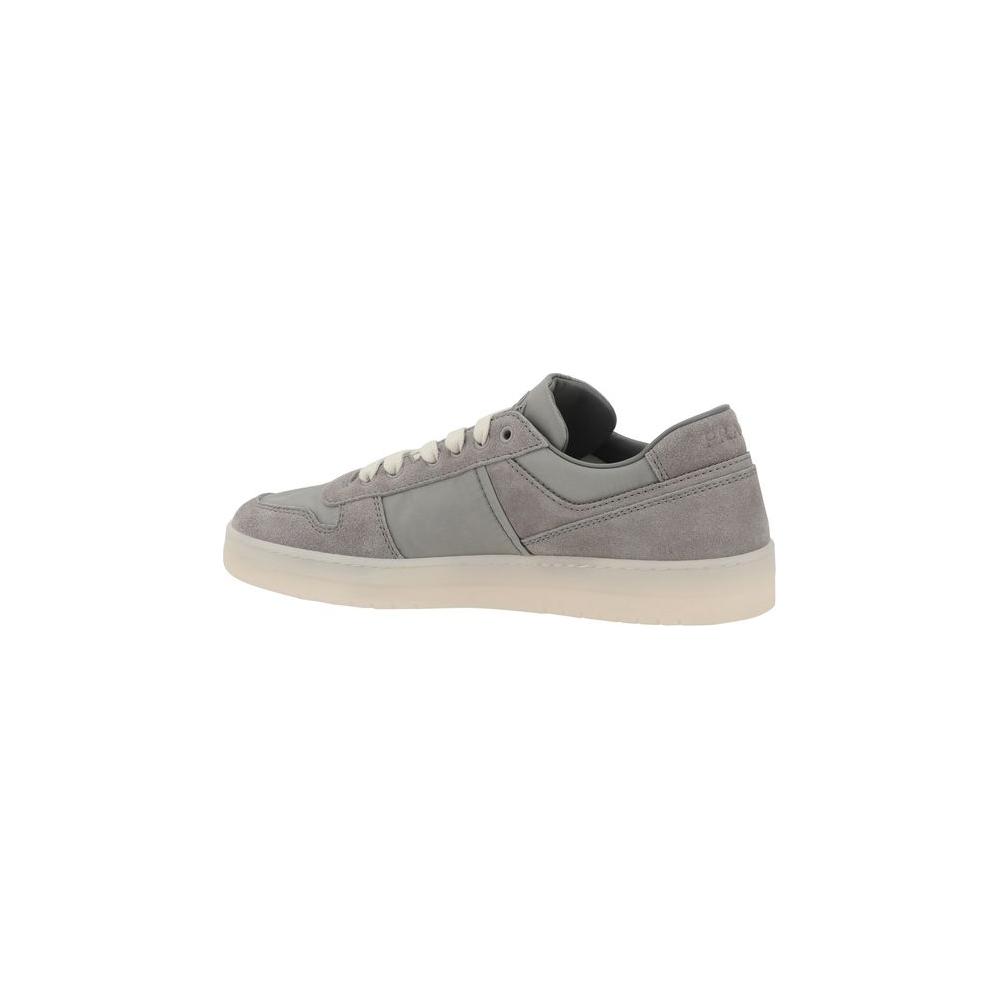 Prada suede leather sneakers in gray with lace-up top and rounded toe, offering elegance and comfort for a refined, casual look.