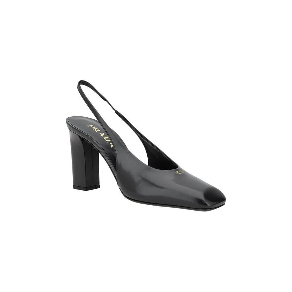 Prada leather pumps with square toe, monogram, slingback design, and geometric heel for a modern, elegant look.