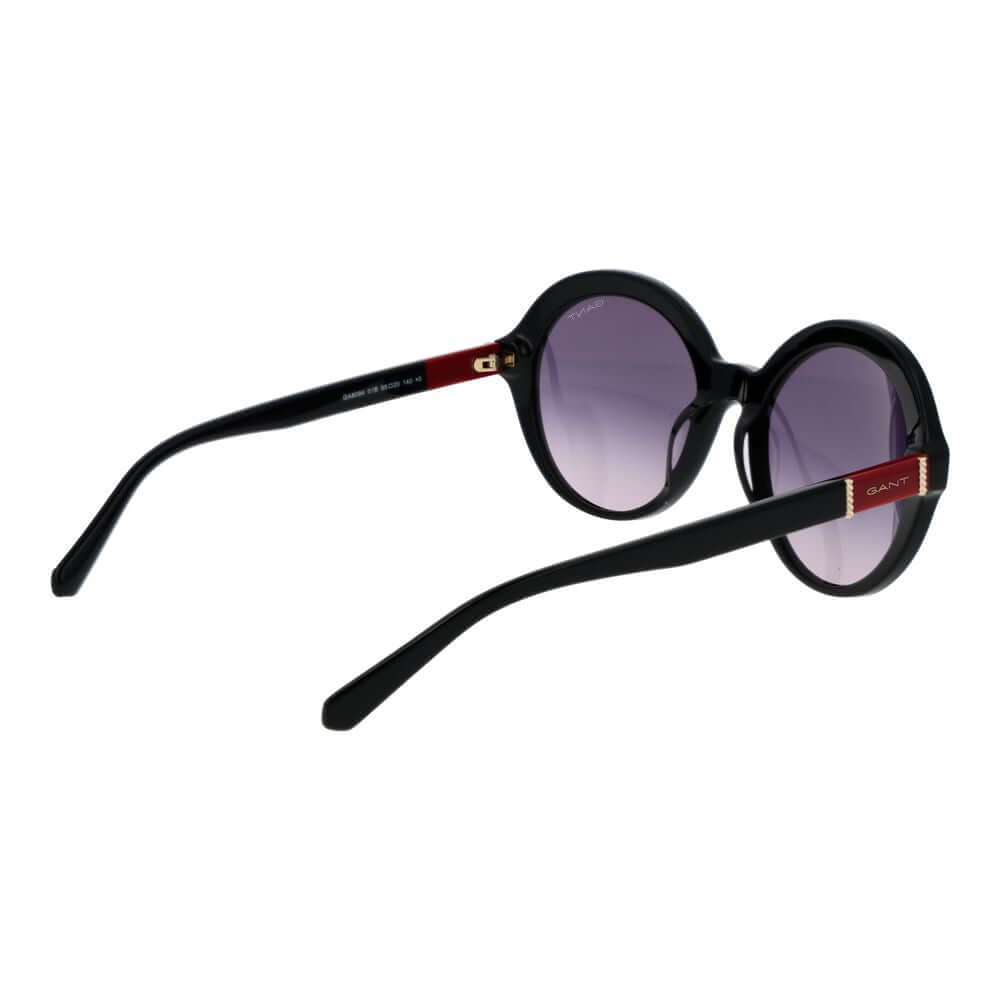 Gant black women's sunglasses with round acetate frame, purple gradient lenses, full-rim design, and 100% UVA/UVB protection.