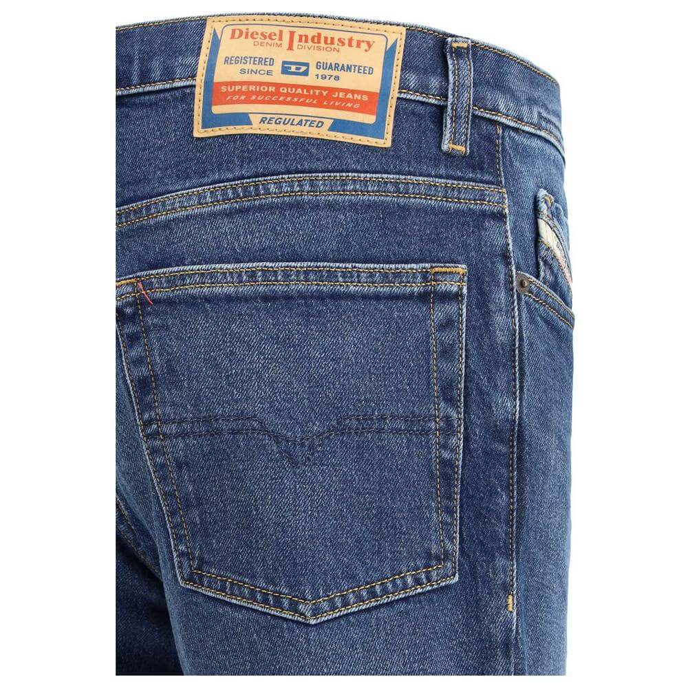 Back view of Diesel 2023 D-Finitive jeans featuring iconic leather patch, showcasing classic five-pocket design and belt loops.