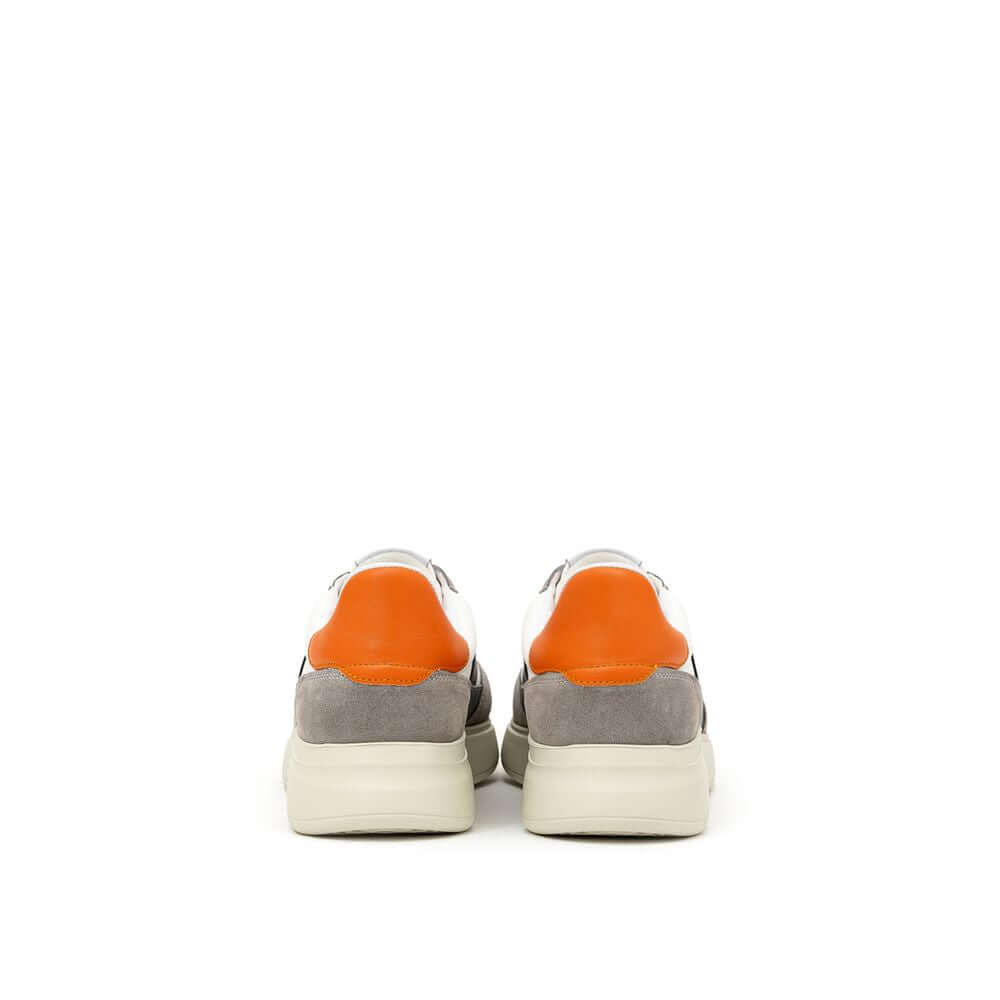 Back view of Axel Arigato Bicolor Fabric and Leather Sneakers with orange heel tab detailing.