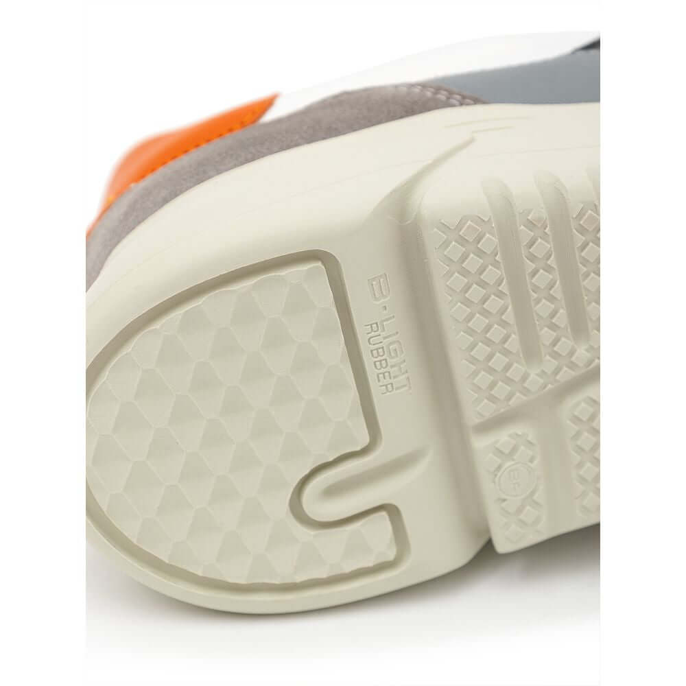 Close-up of the sole of Axel Arigato Bicolor Fabric And Leather Sneaker, highlighting the lightweight and durable design.