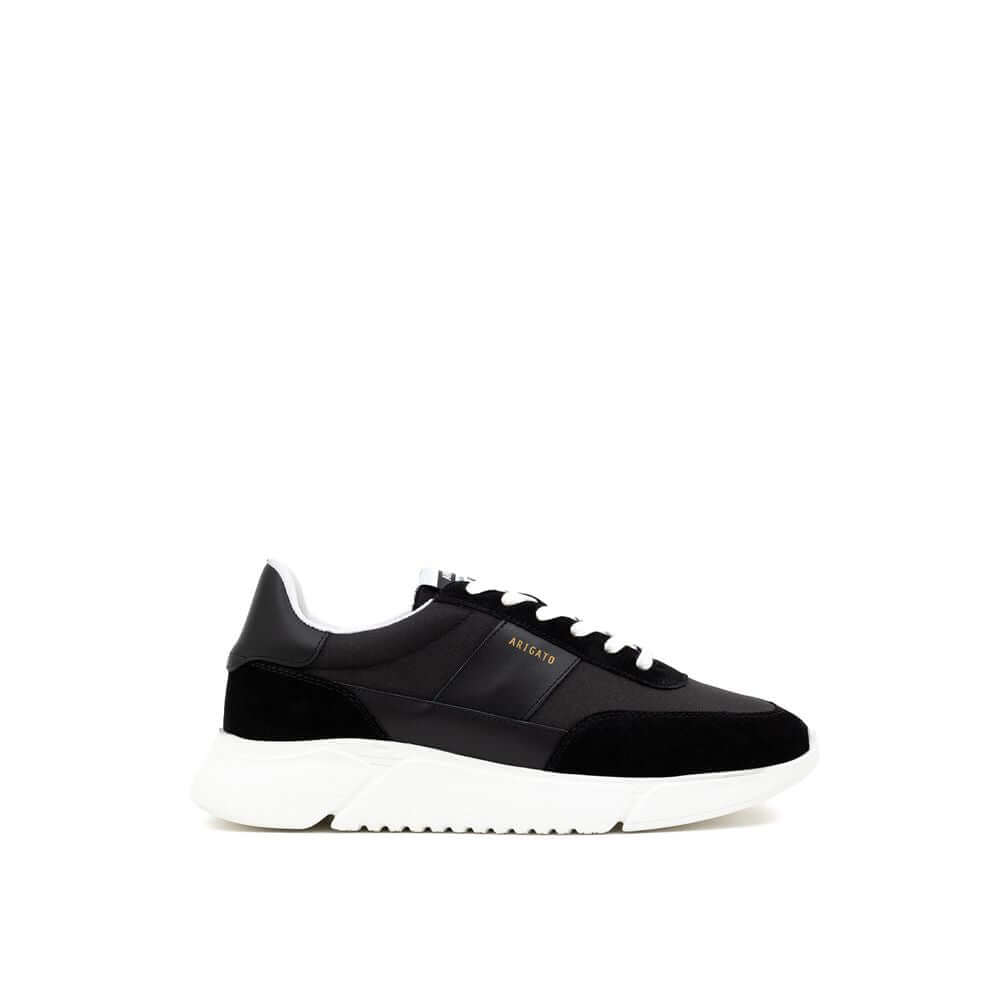 Axel Arigato Genesis Vintage Runner black and white sneaker with leather and suede, lightweight sole, and retro-inspired design.