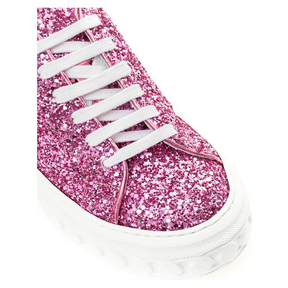 Close-up of Casadei Fuchsia Elegance Leather Sneakers with glitter detail and white laces, showcasing luxury and style in vibrant pink.