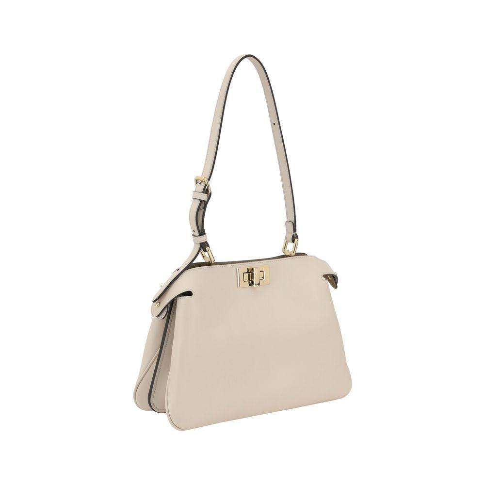 Fendi Peekaboo leather shoulder bag with adjustable top handle in elegant white design, featuring hook-and-eye closure.