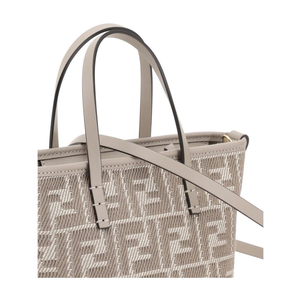 Fendi Roll Mini Handbag with jacquard fabric and denim-effect FF pattern, leather handles, and adjustable strap. Chic and versatile.