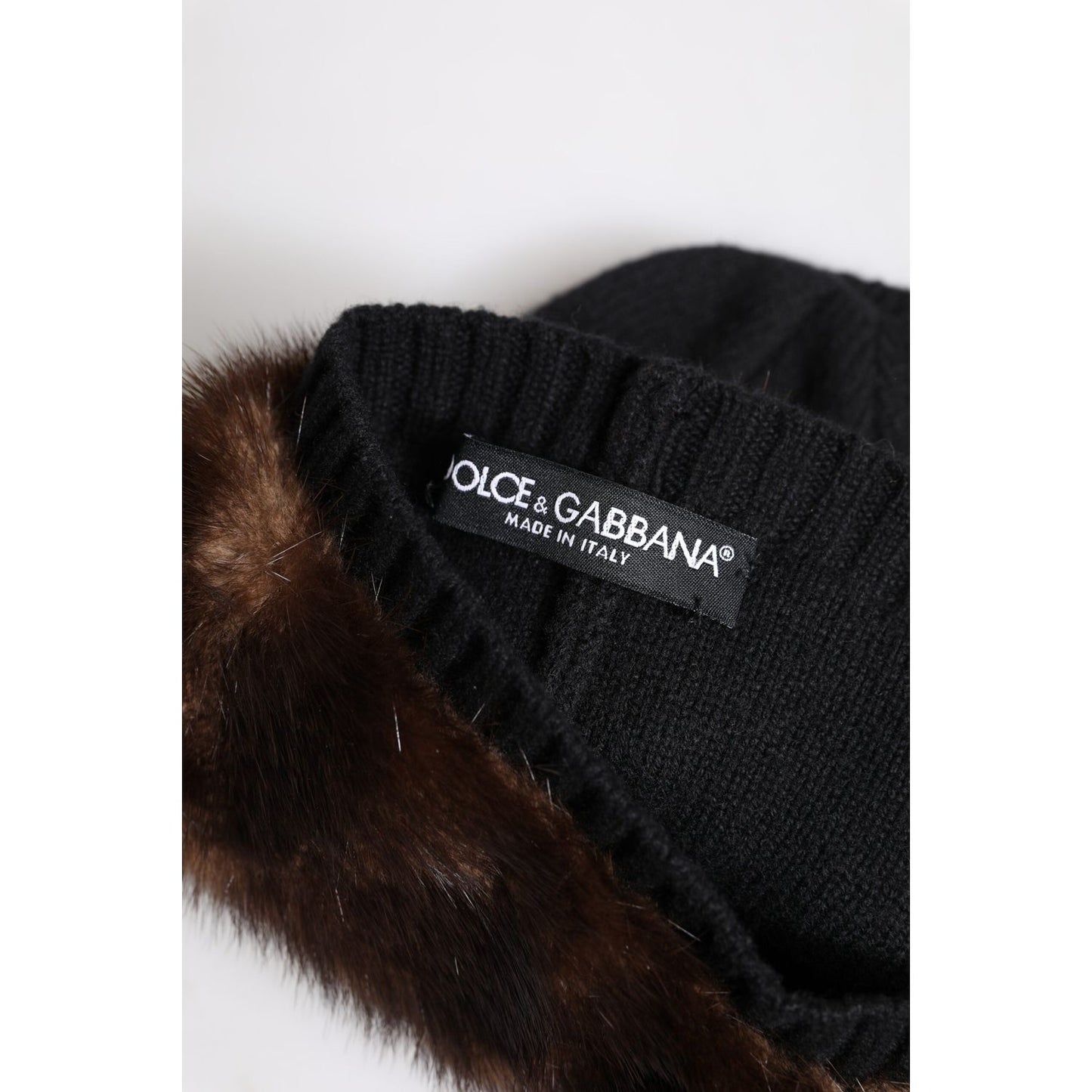 Dolce & Gabbana black knitted winter beanie with fur embellishment, logo detail, made in Italy, minor defect, missing tag.