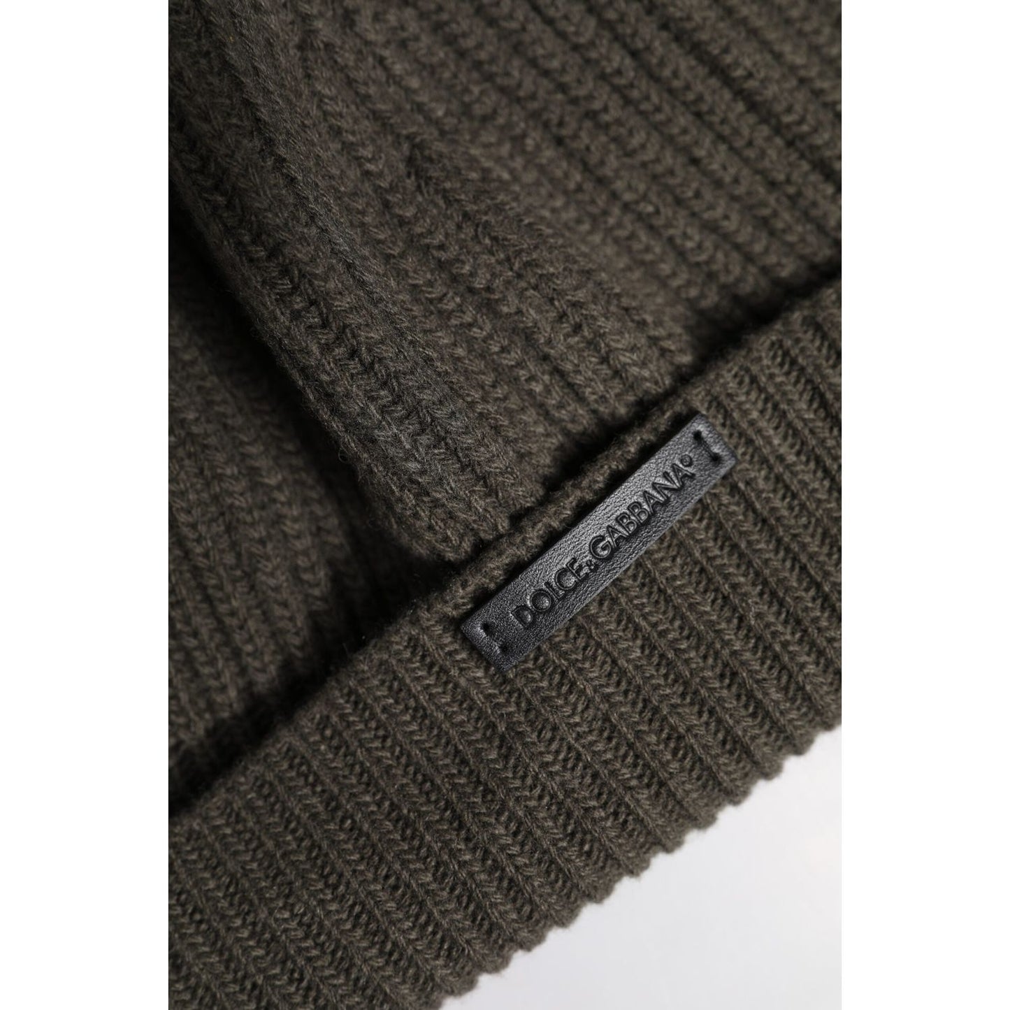Dolce & Gabbana green wool beanie hat with DG plaque detail, dark green knit, 70% wool 30% cashmere, made in Italy, winter accessory.