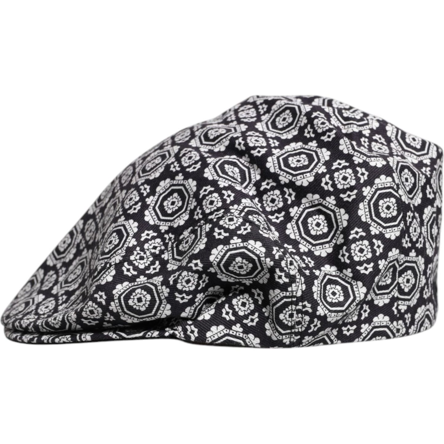 Dolce & Gabbana black and white printed newsboy cap with intricate pattern, made from cotton blend, featuring logo details, authentic fashion.