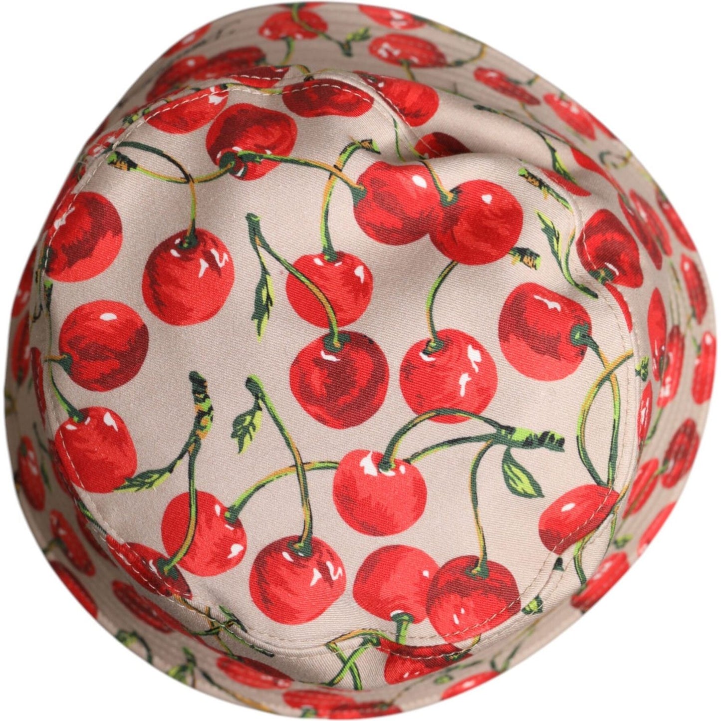 Dolce & Gabbana beige cotton bucket hat with red cherry print, wide brim, made in Italy, men's fashion accessory.