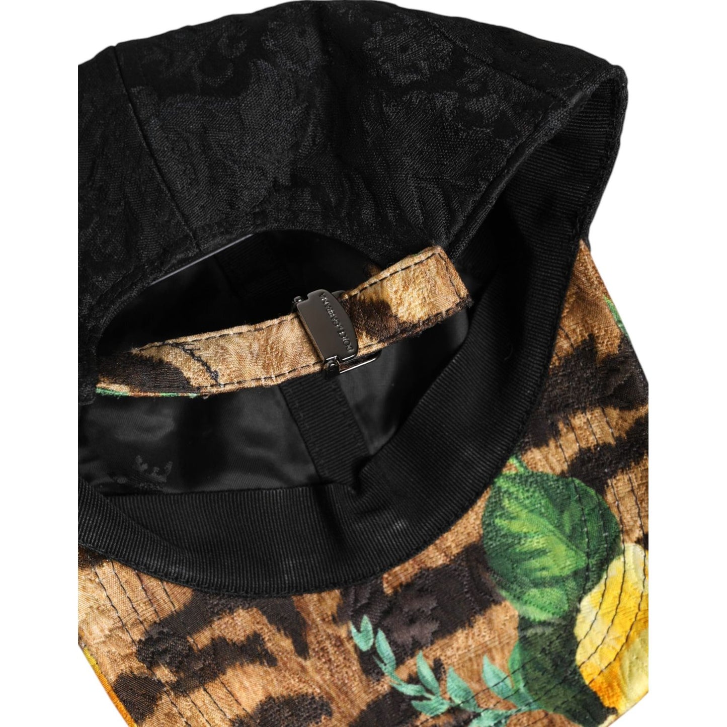 Dolce & Gabbana multicolor baseball cap interior view showing floral pattern and adjustable strap, 6 panel design, luxury fashion accessory.