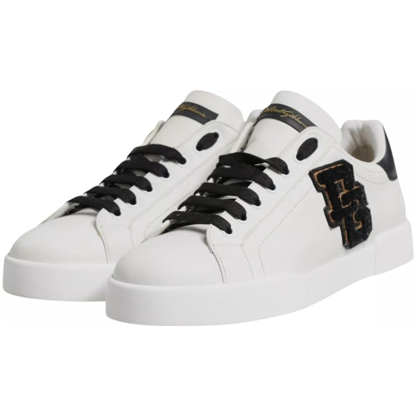 Dolce & Gabbana white leather low top sneakers with black DG logo, rubber sole, lace-up closure, preowned, made in Italy.