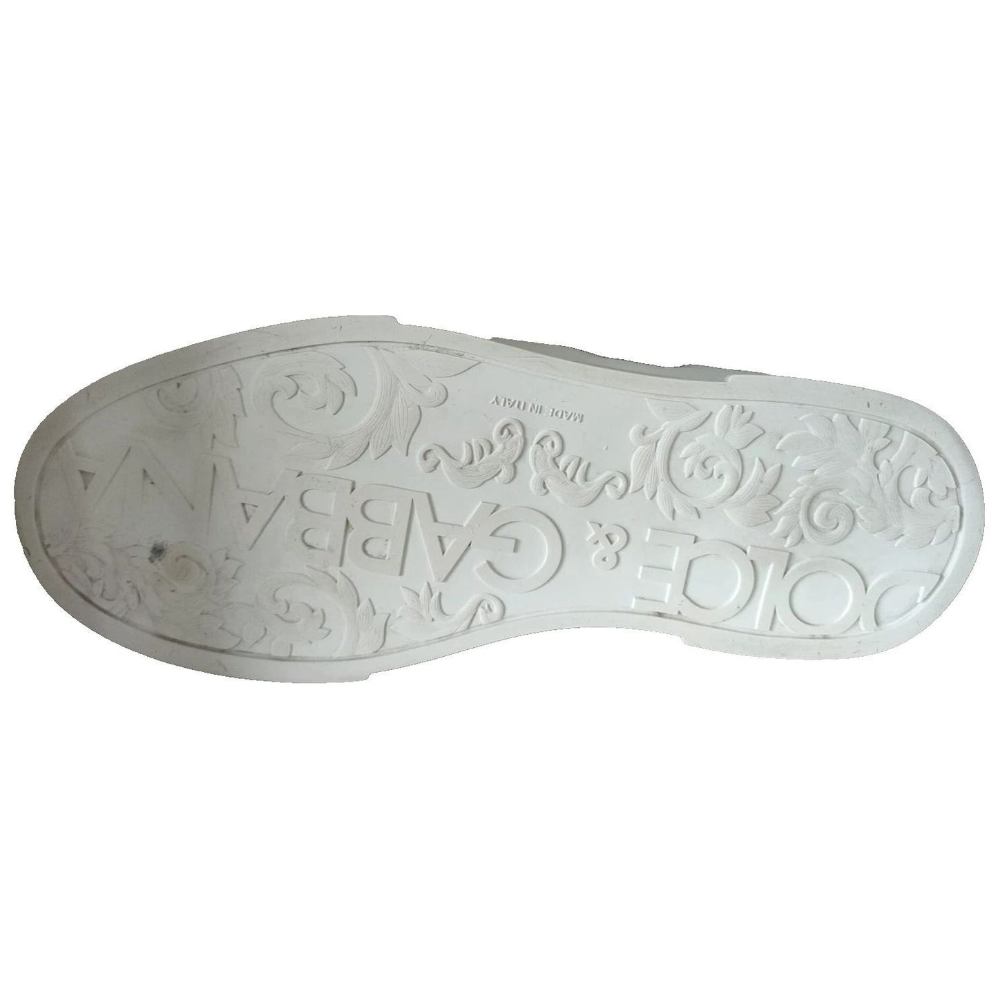 Dolce & Gabbana white sole with embossed logo design on low top sneakers.