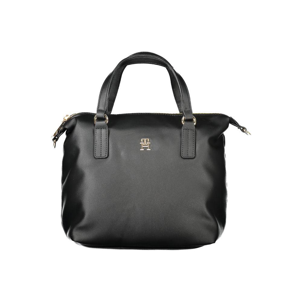 Tommy Hilfiger black polyester women's handbag with logo, adjustable strap, zip closure, and two handles for chic, versatile style.