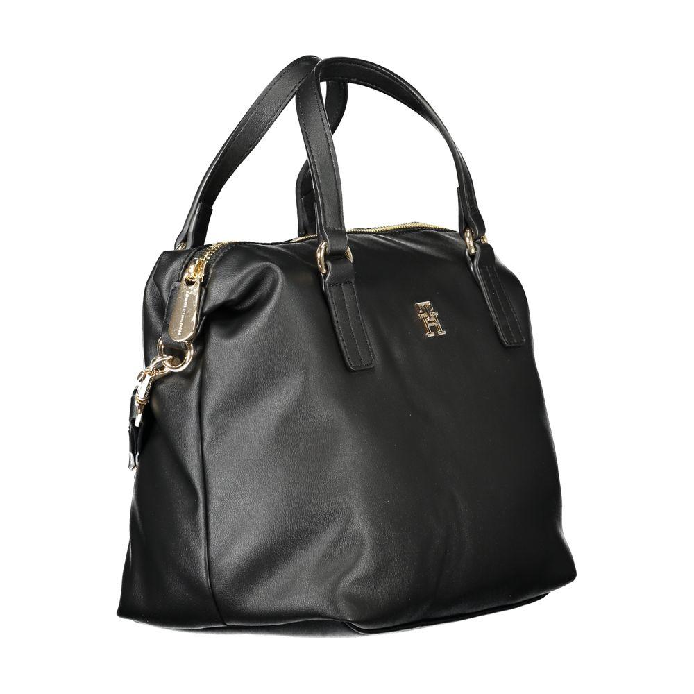 Tommy Hilfiger black polyester handbag with logo, dual handles, detachable strap, and zip closure for chic fashion connoisseurs.