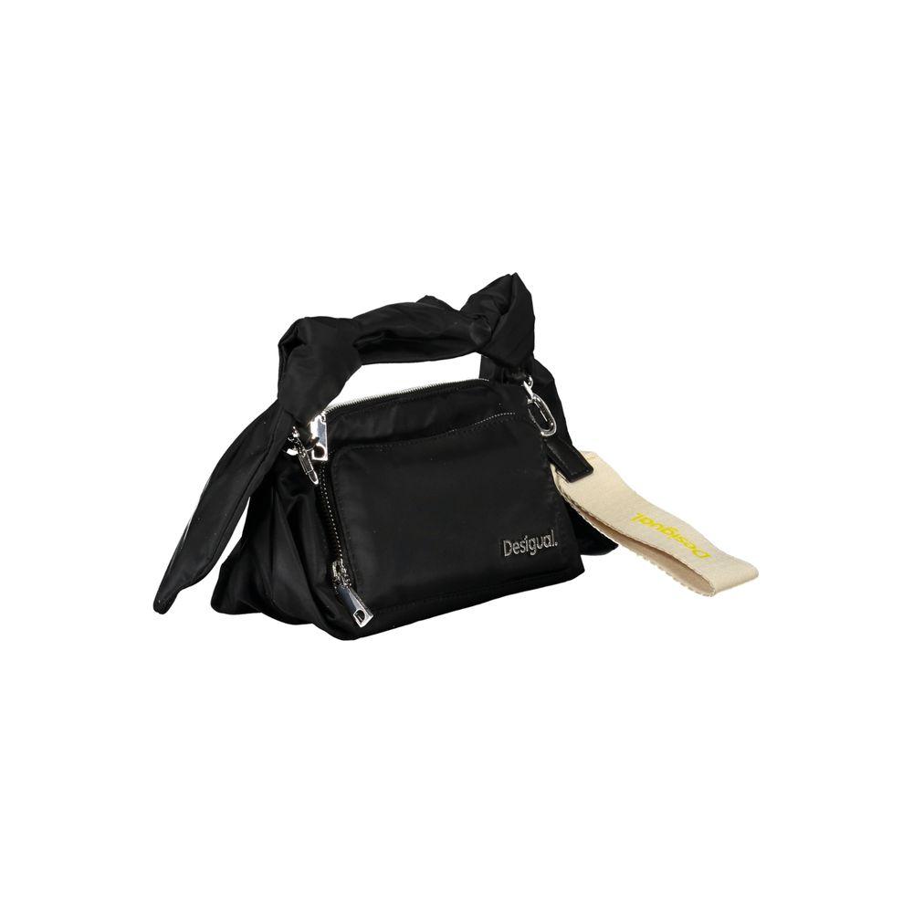 Desigual black polyester handbag with removable strap, external coin purse, and zip closure, featuring contrast details and logo.